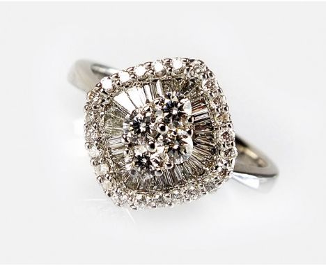 An 18ct white gold diamond cluster ring, designed as a central cluster of four brilliant cut diamonds claw set within a borde