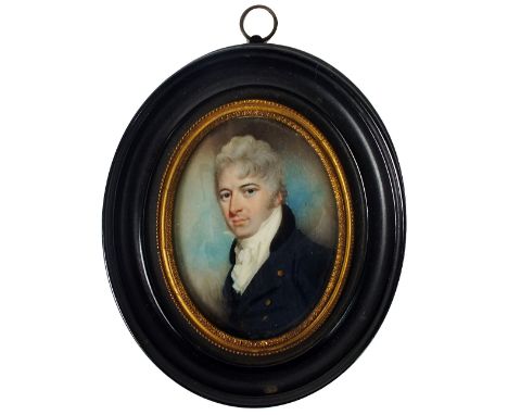 English School (early 19th century)
Portrait of a Gentleman, half length wearing a white stock and dark blue jacket,
oval,
7 