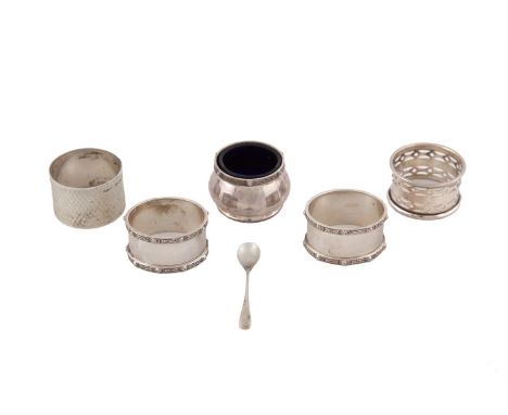 A PAIR OF IRISH COMMEMORATIVE CELTIC REVIVAL PATTERN NAPKIN RINGS, Dublin 1966; together with a similar salt cellar, Birmingh