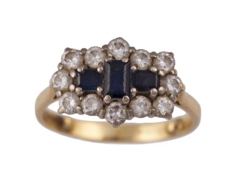 A SAPPHIRE AND DIAMOND RINGComposed of a trio of rectangular-cut sapphires to a surround of twelve round brilliant-cut diamon