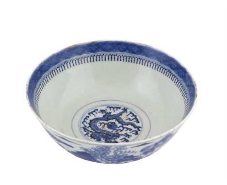 A CHINESE BLUE AND WHITE EXPORT PORCELAIN BOWL, c. 1800 of deep circular form painted with a figures and pagodas in a river a