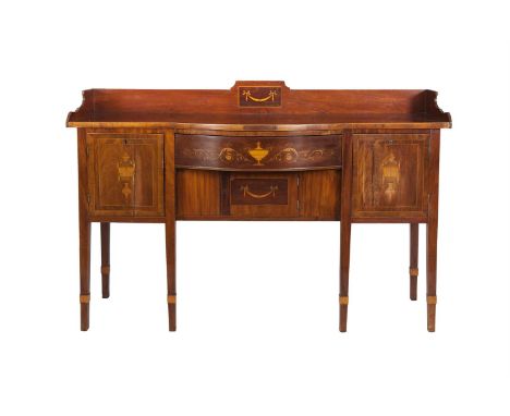 A GEORGE IV INLAID BOW FRONT SIDEBOARD, with raised back above frieze drawer and cupboard flanked by single door cupboards, i