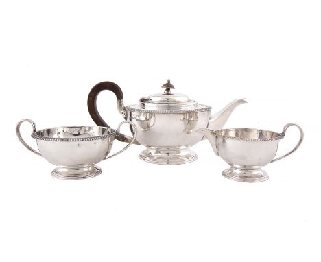 ***PLEASE NOTE ESTIMATE SHOULD READ € 400 - 600 IN PRINTED CATALOGUE***A SILVER THREE PIECE TEA SERVICE, Sheffield c.1934, ma