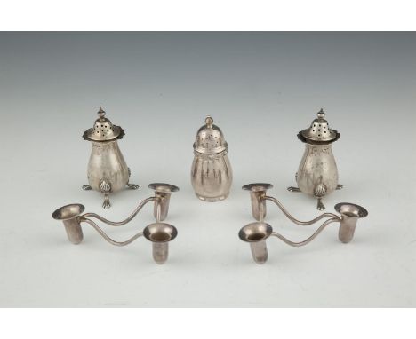 A PAIR OF SMALL BIRMINGHAM SILVER PEPPER POTS; and another with Celtic decoration; and a pair of triangular candle holders, (