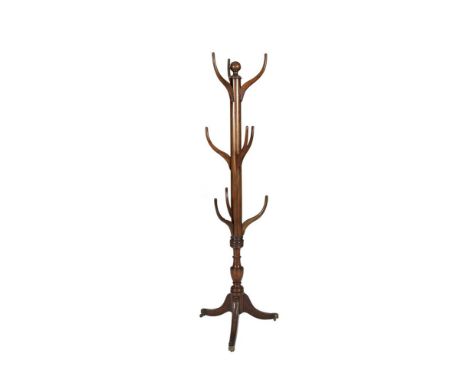 A 19TH CENTURY MAHOGANY HAT AND COAT STAND, with ball finial atop a plain turned column with upturned branches and raised on 