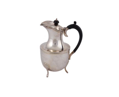 AN EDWARDIAN SILVER COFFEE POT, Sheffield 1906, mark of Walker & Hall, in the Georgian Revival taste, with ebon handle and fi