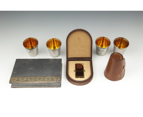A VINTAGE GUCCI CIGARETTE LIGHTER, in original case; together with a set of four silver plated and enamel travelling beakers 