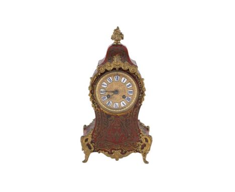 A LATE 19TH CENTURY FRENCH RED BOULLE CASED MANTLE CLOCK, in the Louis XIV taste, with applied cast brass mounts, the brass f