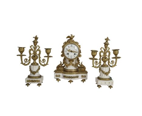 A CLOCK GARNITURE IN LATE 18TH CENTURY FRENCH STYLE, c.1900, the clock with flower-swagged enamel dial, surmounted by a billi