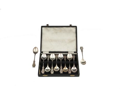 A CASED SET OF TEN IRISH COMMEMORATIVE CELTIC PATTERN SILVER TEASPOONS, Dublin 1966, (c.248g)