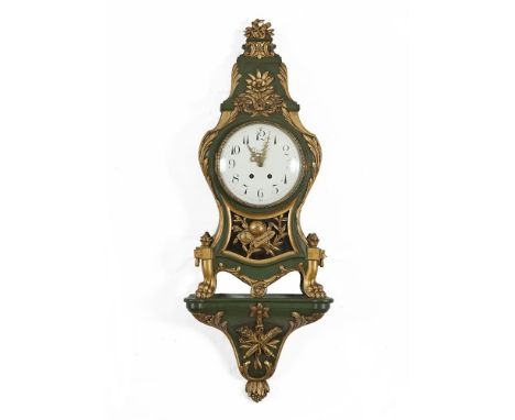 ***PLEASE NOTE THIS LOT IS INCORRECTLY ILLUSTRATED IN PRINTED CATALOGUE***A SWISS DIRECTOIRE STYLE CARVED WOOD GREEN AND GILT