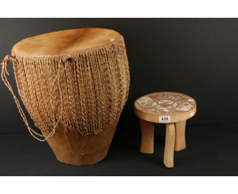African cowhide bongo drum with twine fastenings, 47cm high, together with a small African beadwork three-legged wooden stool