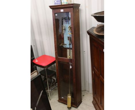 PO36 Post Office Master Clock within an Oak Glazed Case, with pendulum and accessories including key, 142cm high x 30cm wide 