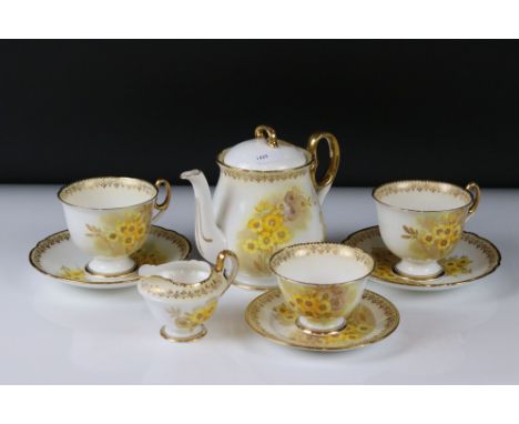 Shelley Tea for Two Set, gilt and yellow flower decoration, comprising Tea Pot, Two Tea Cups, Two Saucers, Tea Plate, Milk an