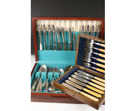 Two wooden cased sets of cutlery to include a fish knife and fork set. 