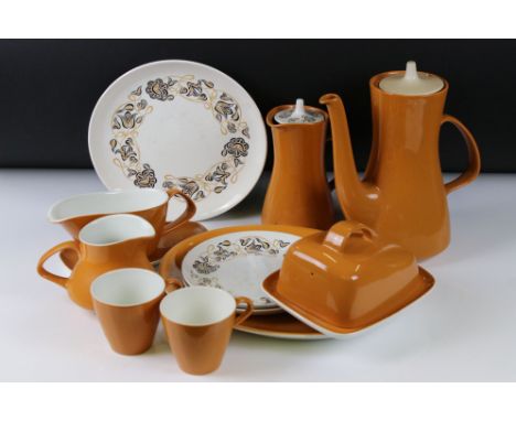 Poole Pottery Dinner and Tea Ware decorated in two tone orange and white ground with a floral pattern, approximately Coffee P