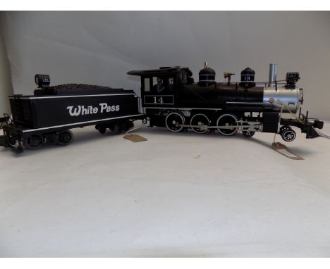 Bachmann 4-6-0 steam locomotive and tender, no 14 "Whitepass" tender, some wear, full length approximately 29".