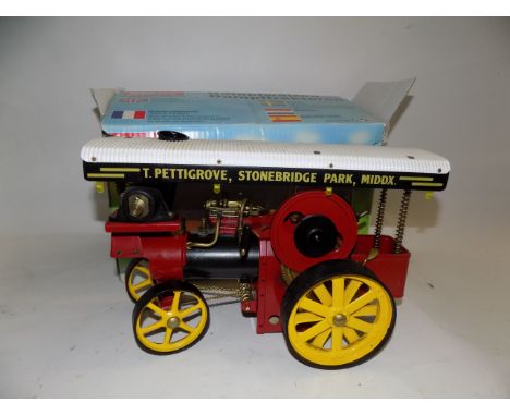 A Wilesco live steam traction engine, boxed.