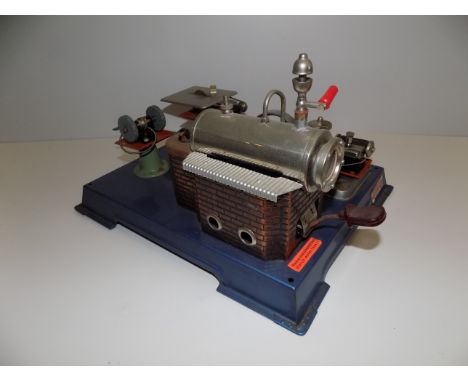 A Wilesco live steam stationary steam engine, lacks chimney.