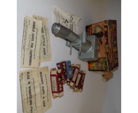 Walt Disney :- A Johnson - Disney tin plate film strip projector, battery operated with six film strips, original box, full, 
