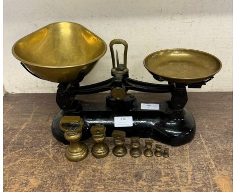 A Libra Scale Co. scales with graduated brass weights 