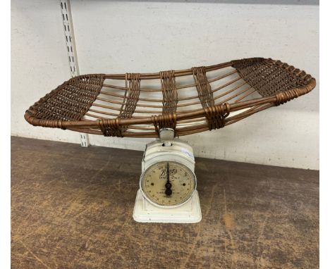 A set of Boots family scales, to 20lb with wicker basket