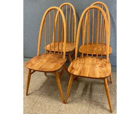 A set of four Ercol Blonde elm and beech Quaker chairs 