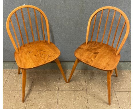 A pair of Ercol Blonde elm and beech Windsor dining chairs 