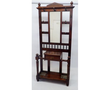 An Edwardian hallstand with hat hooks, glove box and stick stands