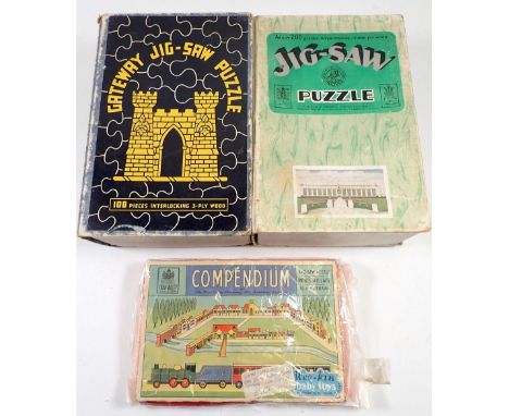 A Chad Valley Hoover factory jigsaw puzzle, a Gateway Watermark puzzle and a Chad Compendium model village - all complete