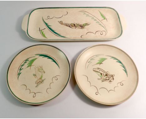 A vintage Poole pottery lobster dish and two plates decorated frog and seahorse, 43cm long