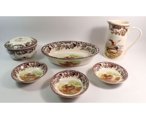 A Spode Woodland large jug, small tureen, three dessert bowls and oval vegetable dish, 32cm wide