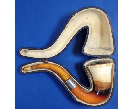 A 19th century meerschaum calabush pipe of tulip form with amber mouthpiece and silver collar, London 1873 in fitted case, 16