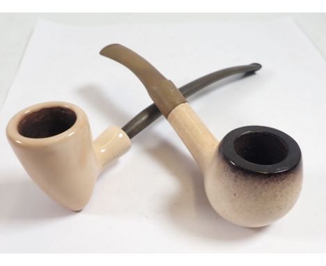 A British meerschaum pipe with apple bowl and a ceramic 'pixy' head pipe marked Manhattan, 17cm