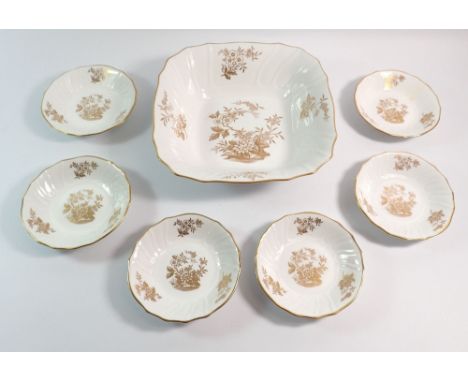 A Spode 'Louvain' gilt and white fruit bowl, 23cm and six small dishes