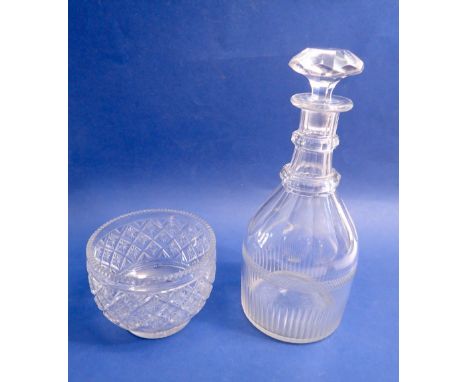A 19th century cut glass decanter, 27cm tall and a cut glass tea caddy mixing bowl