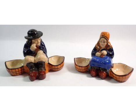 Two Quimper trinket dishes painted seated old man and woman, signed HB, 16cm wide