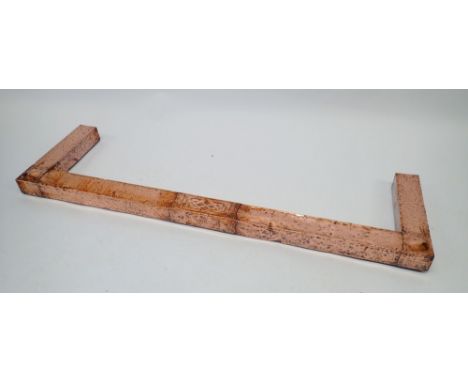 An Arts &amp; Crafts hammered cooper fender with embossed and stud decoration, 138.5 x 38.5cm