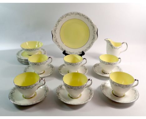 A Royal Albert vintage yellow tea service comprising six cups and saucers, six tea plates, six cake plates, milk and sugar
