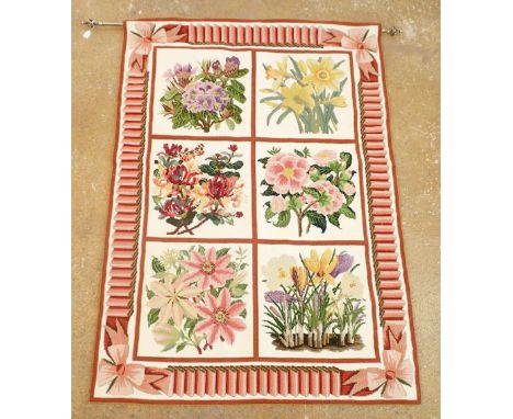A large handmade tapestry wall hanging depicting six sectional floral displays with ribbon design borders, 111 cm wide x 154c