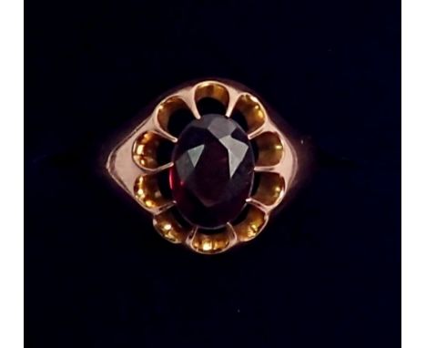 A 9 carat rose gold gentlemans ring claw set oval cut amethyst, size R, 4.8g