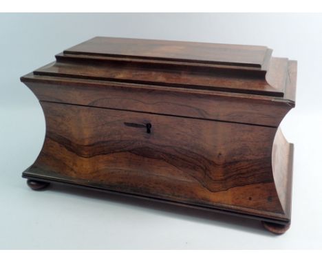 A 19th century rosewood sarcophagus form tea caddy, 37cm wide