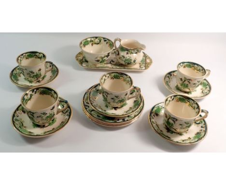 A Masons Chartreuse part tea service comprising five cups and five saucers, three tea plates, jug, sugar and sandwich plate