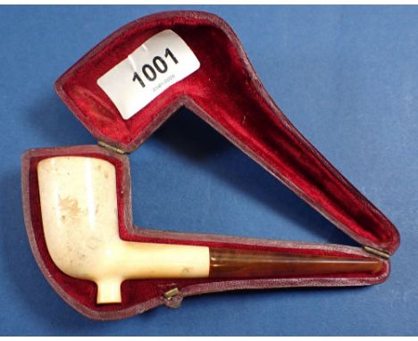 An Austrian meerschaum pipe with amber mouthpiece in fitted case, 12cm