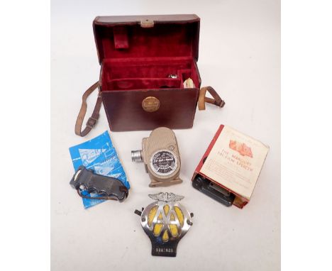 A Bell &amp; Howell cine camera, Westons light meter in fitted case with instructions and splicing machine plus an AA badge