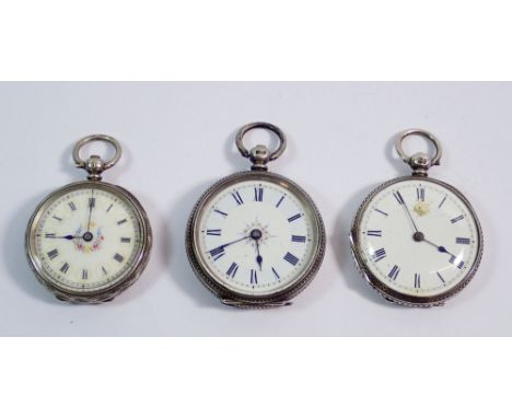 Three silver fob watches with enamel dials and engraved decoration 