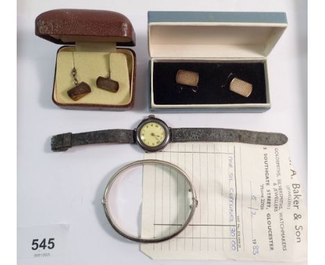 A silver watch, two silver pairs of cufflinks and a silver bangle