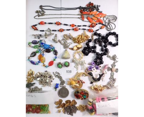 A group of vintage and later costume jewellery and beads 