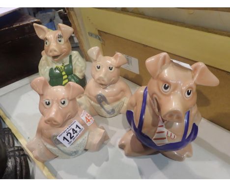 Four Wade ceramic NatWest pigs. Not available for in-house P&amp;P, contact Paul O'Hea at Mailboxes on 01925 659133 