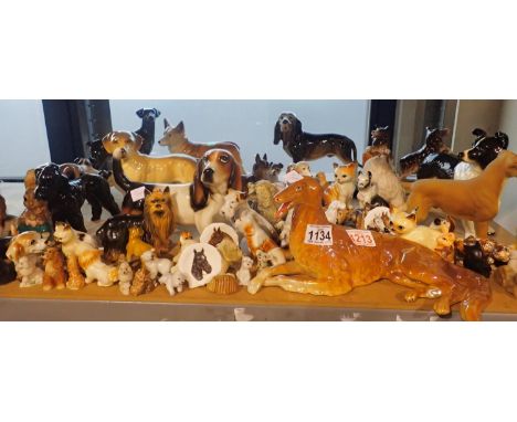Large collection of ceramic dogs and other animal figures (30). Not available for in-house P&amp;P, contact Paul O'Hea at Mai